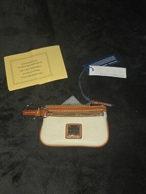 Dooney & Bourke Cream Pebbled Leather Mini Pouch with Brown Trim and Keyring